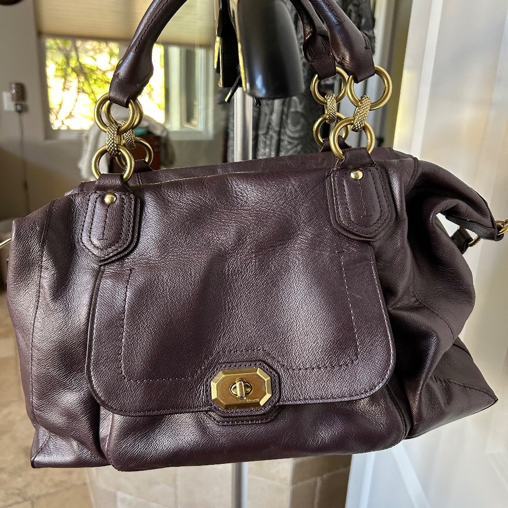 Coach Dark Mauve Colored purse.  Clean.  Great condition